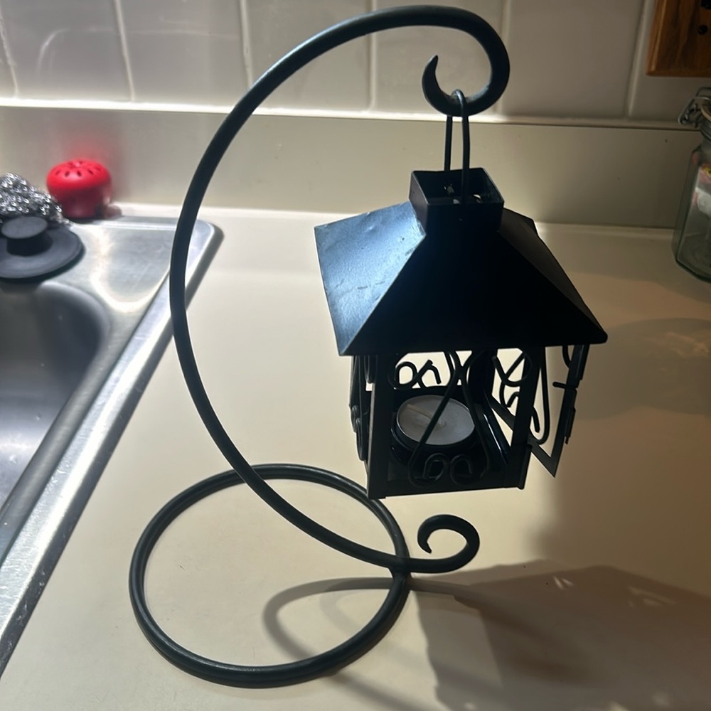 Rare find vintage black metal hanging house with stand and candle holder